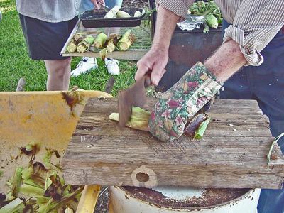 Malcolm shucking HOT roasted sweet corn in '02