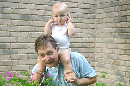 Paul Cox with Baby
