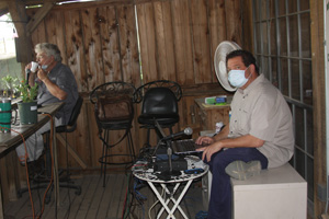 Milton and Calvin enjoying a day on the porch at Milbergers Nursery